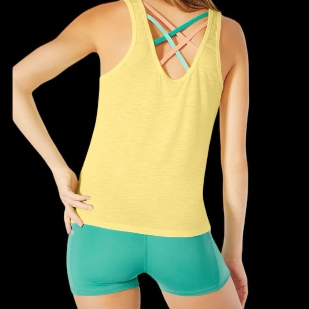 Marika Bailey tank in pale banana criss cross back. Athleisure NWT size Med.